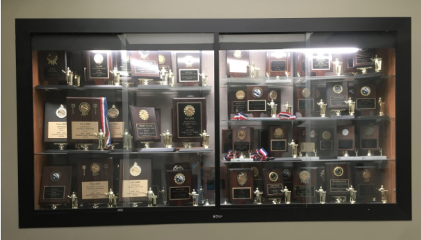 An impressive collection of trophies and plaques won by the CHS Debate Team