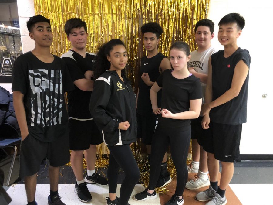 Last year's winning team, from left to right: Marcus Pardasie, Chris Raymond, Keyla Hiciano, Marcus Ray, Ms. Taliento, Vincent Cristantiello, and Jeffrey Kwon