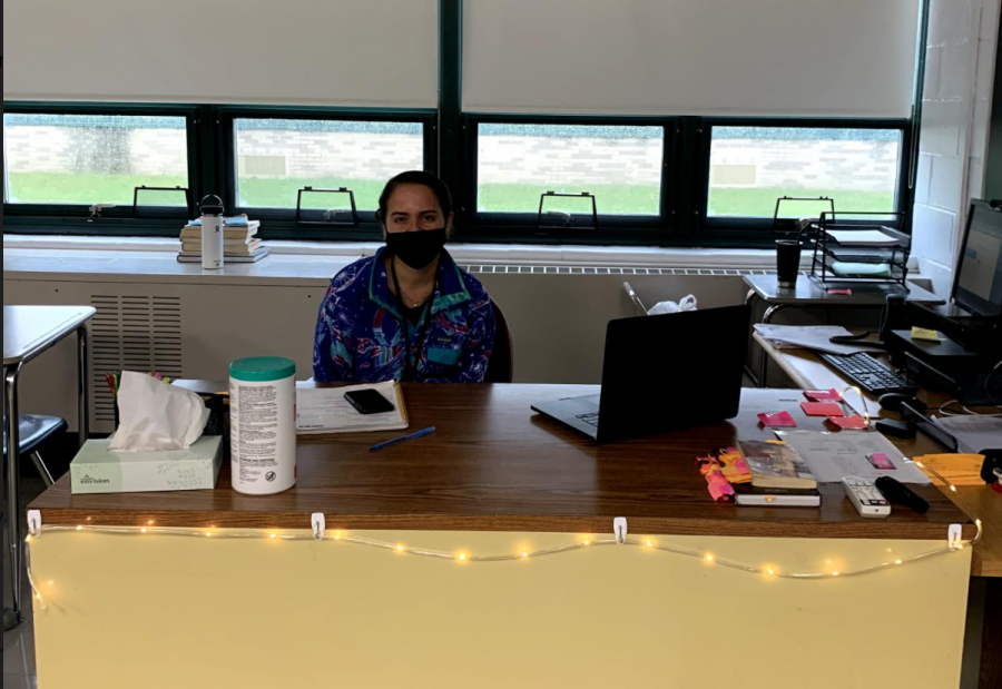 Ms. Sandoval at her new desk in C13