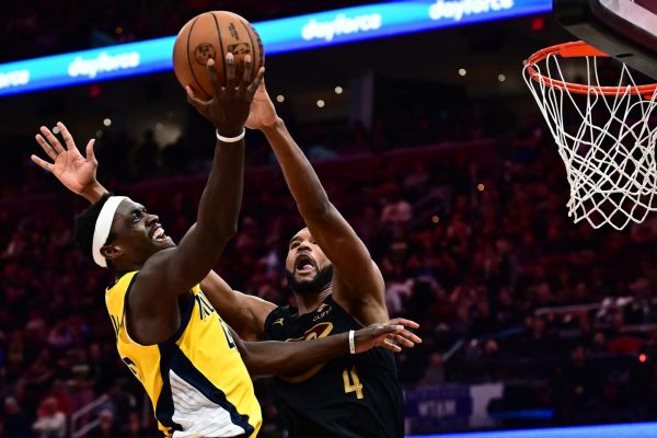 May 13, 2025; Cleveland, Ohio, USA; Indiana Pacers forward Pascal Siakam (43) drives to the basket against Cleveland Cavaliers forward Evan Mobley (4) during the second half of game five of the second round for the 2025 NBA Playoffs at Rocket Arena. Mandatory Credit: Ken Blaze-Imagn Images