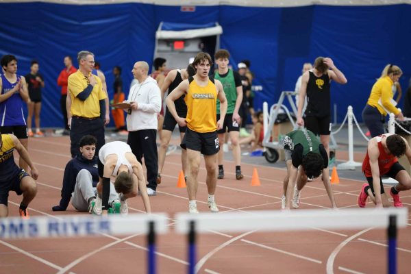 Will Cusick prepares for hurdles at the NJSIAA Sectional Championships in Tom's River, NJ.