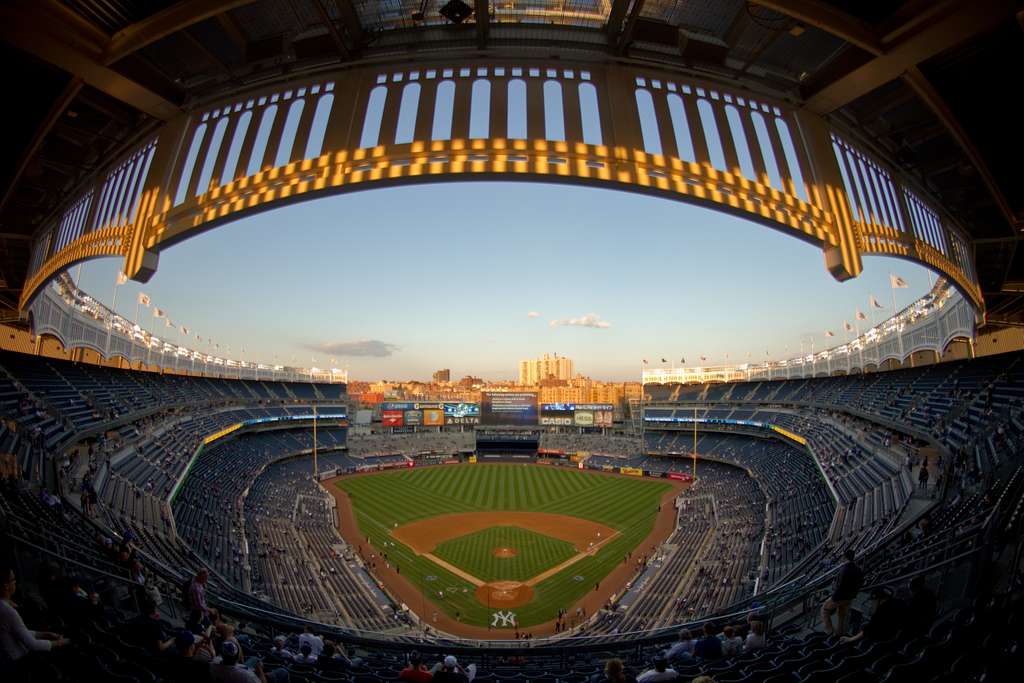 A view of Yankee Stadium in Bronx, N.Y., at sunset prior to the start of a game on Sept. 18, 2014. The Yankees hosted Airmen for the singing of the national anthem, Color Guard presentation, and F-16C Fighting Falcon flyover in honor of the U.S. Air Force 67th birthday. (U.S. Air National Guard photo by Tech. Sgt. Matt Hecht/Released)