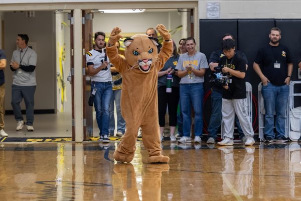 Undeneath the Charlie the Cougar costume was Ms. Ofshinsky, bringing the spirit.