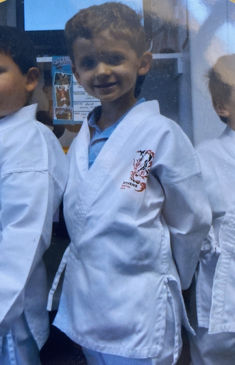 Senior Ryan Honczarenko in martial arts as a child