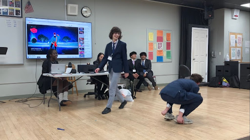 A delegate of Italy does the “Thank You” dance during this year’s DISEC Fun MUN. 